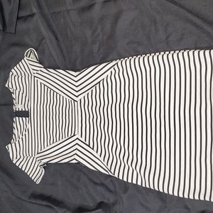 Xhilaration sheath dress with a flattering black and white striped design
